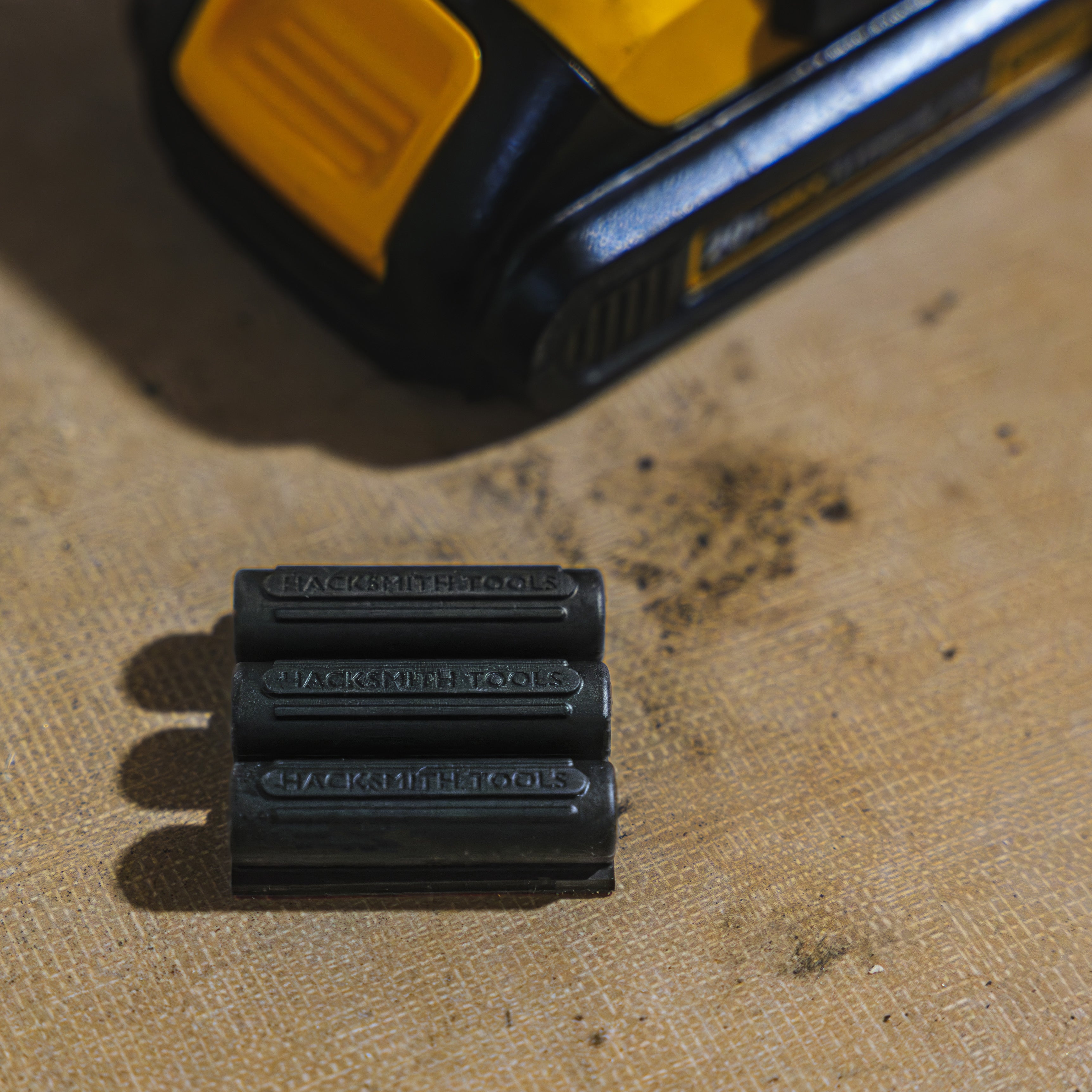 Hacksmith Tools 10-slot drill bit holder bandolier with organized slots for easy access to drill bits.