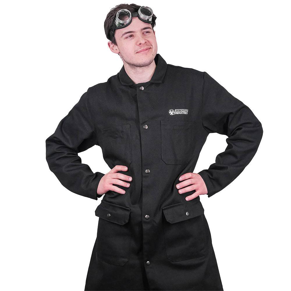 Fire-resistant workwear shop coat from Engineered By Hacksmith, durable fabric with adjustable collar and multiple pockets for safety.