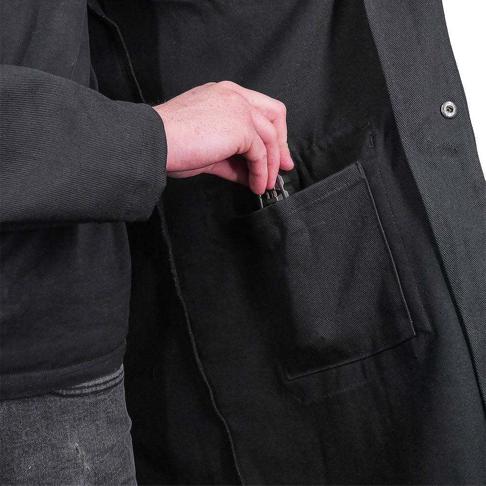 Fire-resistant shop coat by Engineered By Hacksmith, durable workwear with safety features, shown in XS size on model.