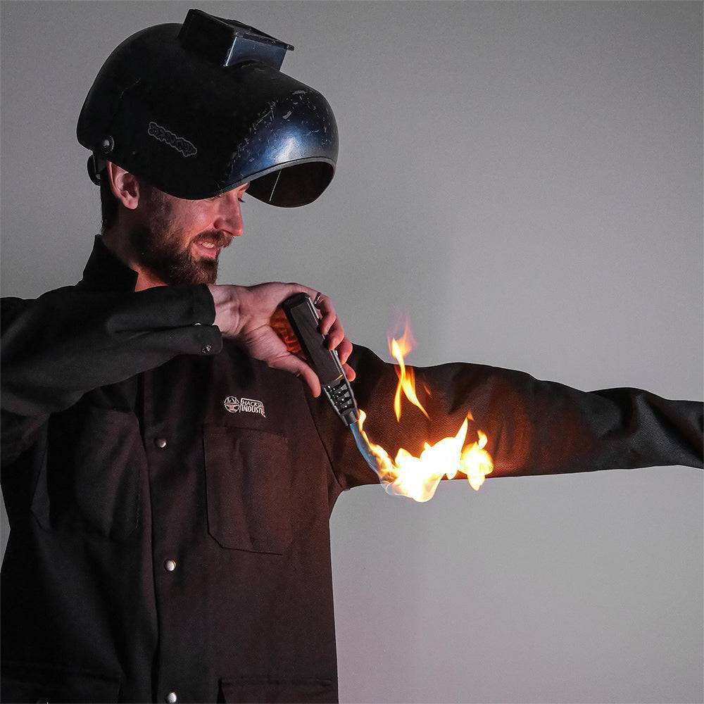 Fire-resistant shop coat by Engineered By Hacksmith, durable workwear with safety features, shown in a close-up image.