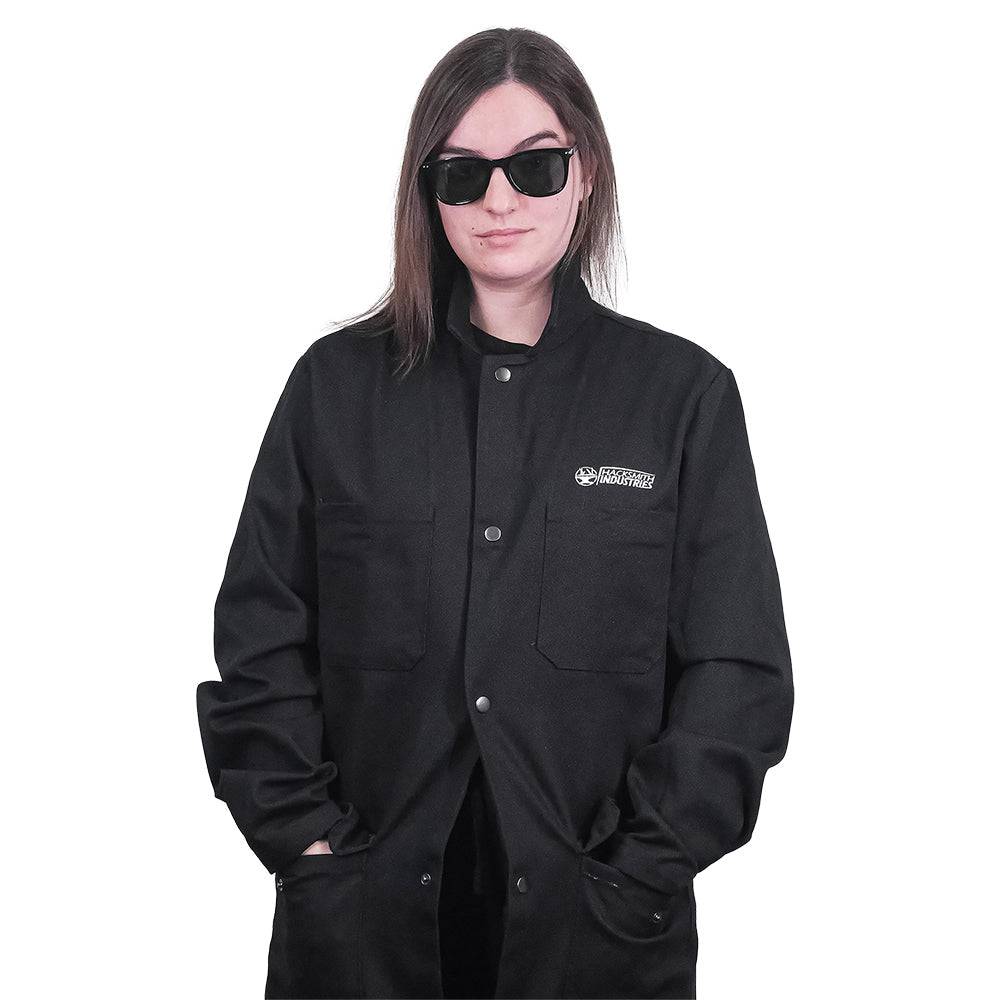 Fire-resistant shop coat by Engineered By Hacksmith, durable workwear with safety features, shown in XS size.