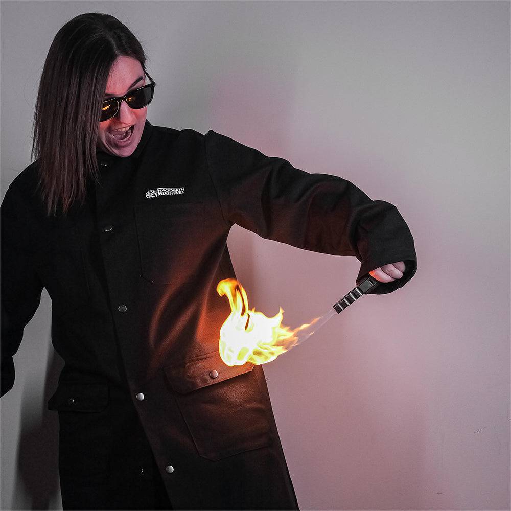 Fire-resistant shop coat by Engineered By Hacksmith, durable workwear with long sleeves and safety features for industrial work environments.