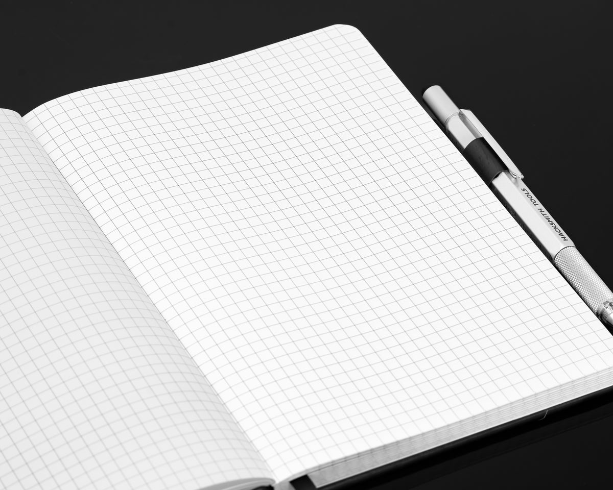 Engineered By Hacksmith inventor's notebook with lined pages and cover, designed for creative projects and technical notes.