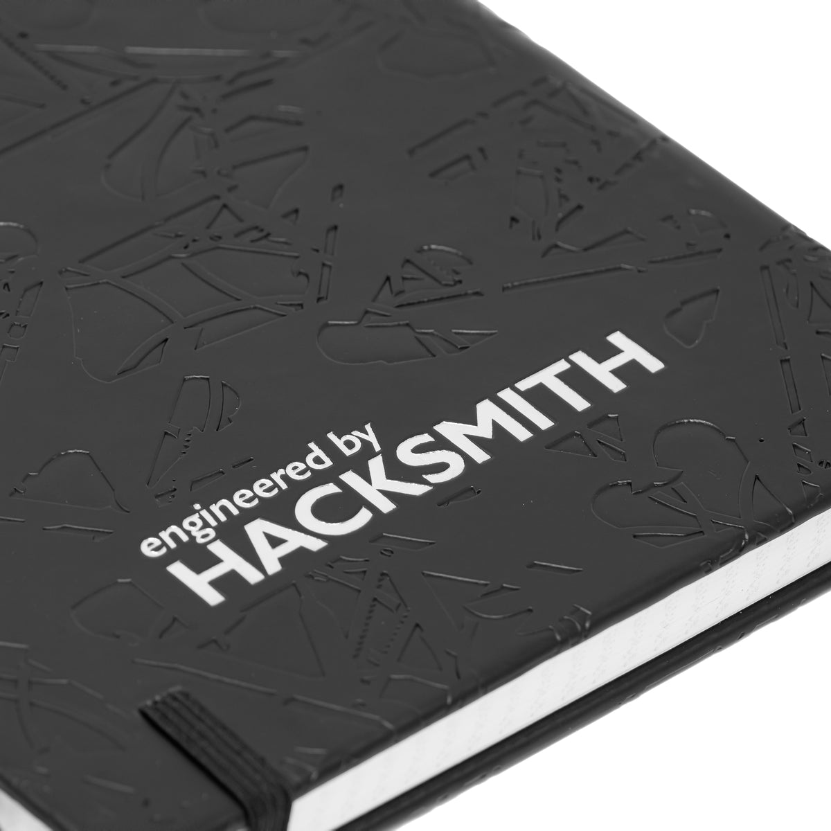 Engineered By Hacksmith The Inventor's Notebook Add-on showing a sleek, open notebook with sketches and notes for inventors.